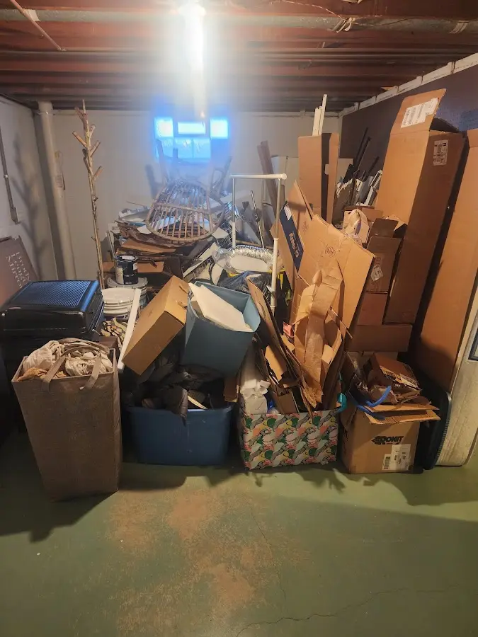 Roll-off dumpster container at job site for 2 Yard Dumpster Rental in Swainsboro